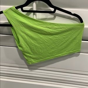 Off one shoulder tank crop top .